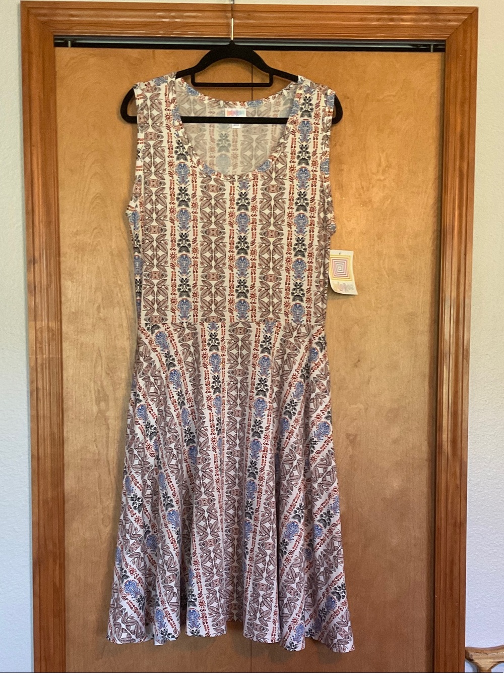 LuLaRoe Sleeveless Midi Dress in Cream, Blue, and Brown Floral Stripe
